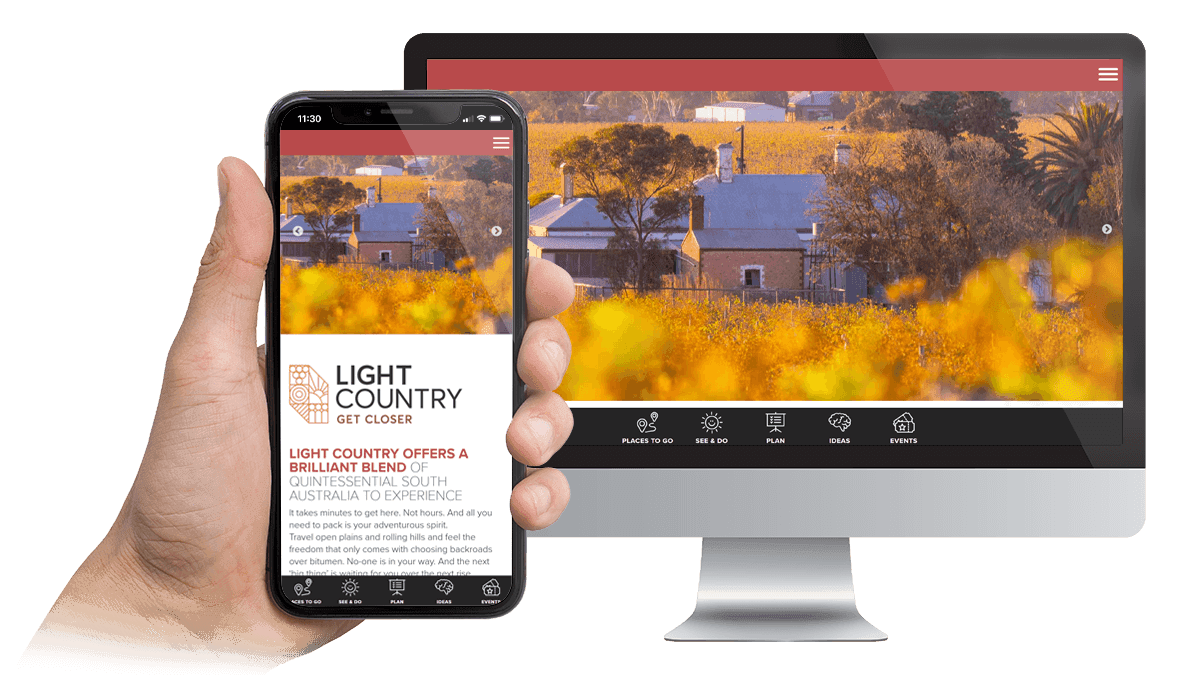 Light Country tourism website displayed on a desktop monitor and smartphone