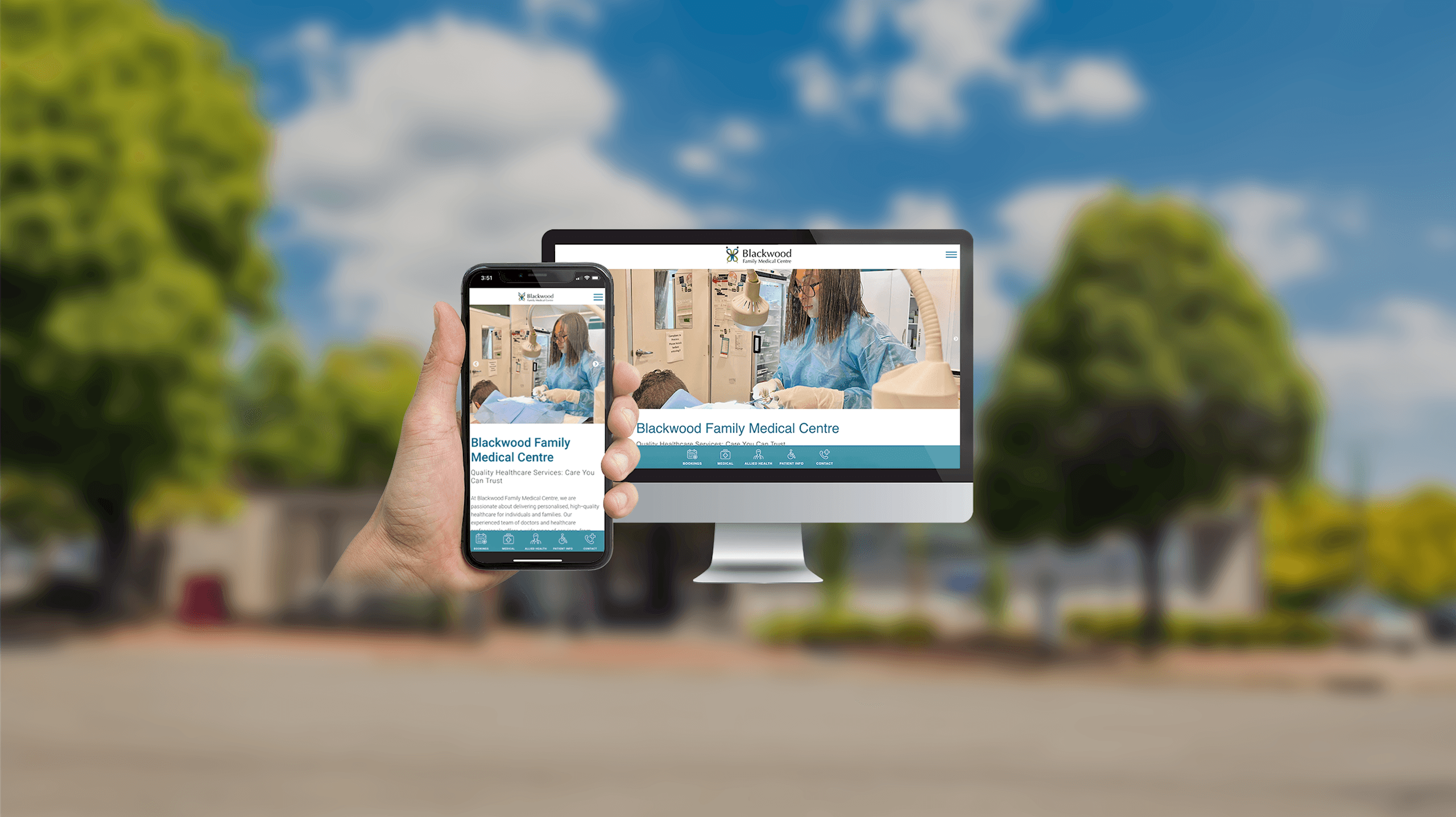 Blackwood Family Medical Centre website homepage displayed on a desktop monitor and smartphone outside the clinic