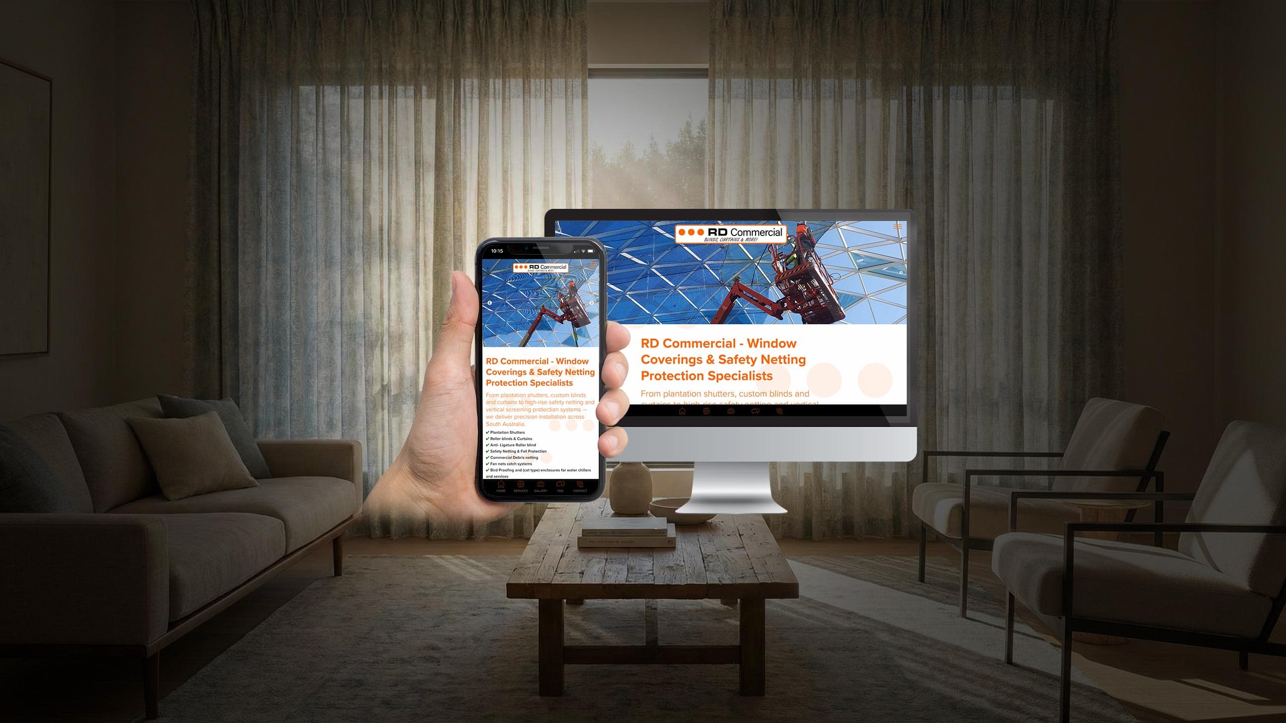 RD Commercial website displayed on desktop and mobile in a curtained living room setting