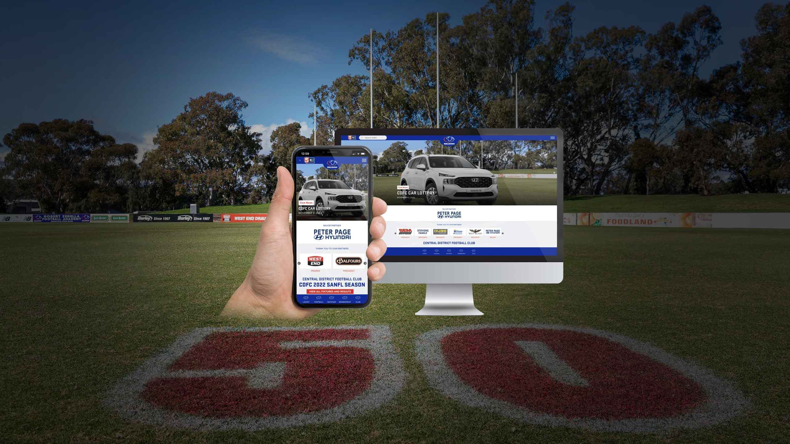Central District Football Club website homepage on a desktop monitor and smartphone on the football oval