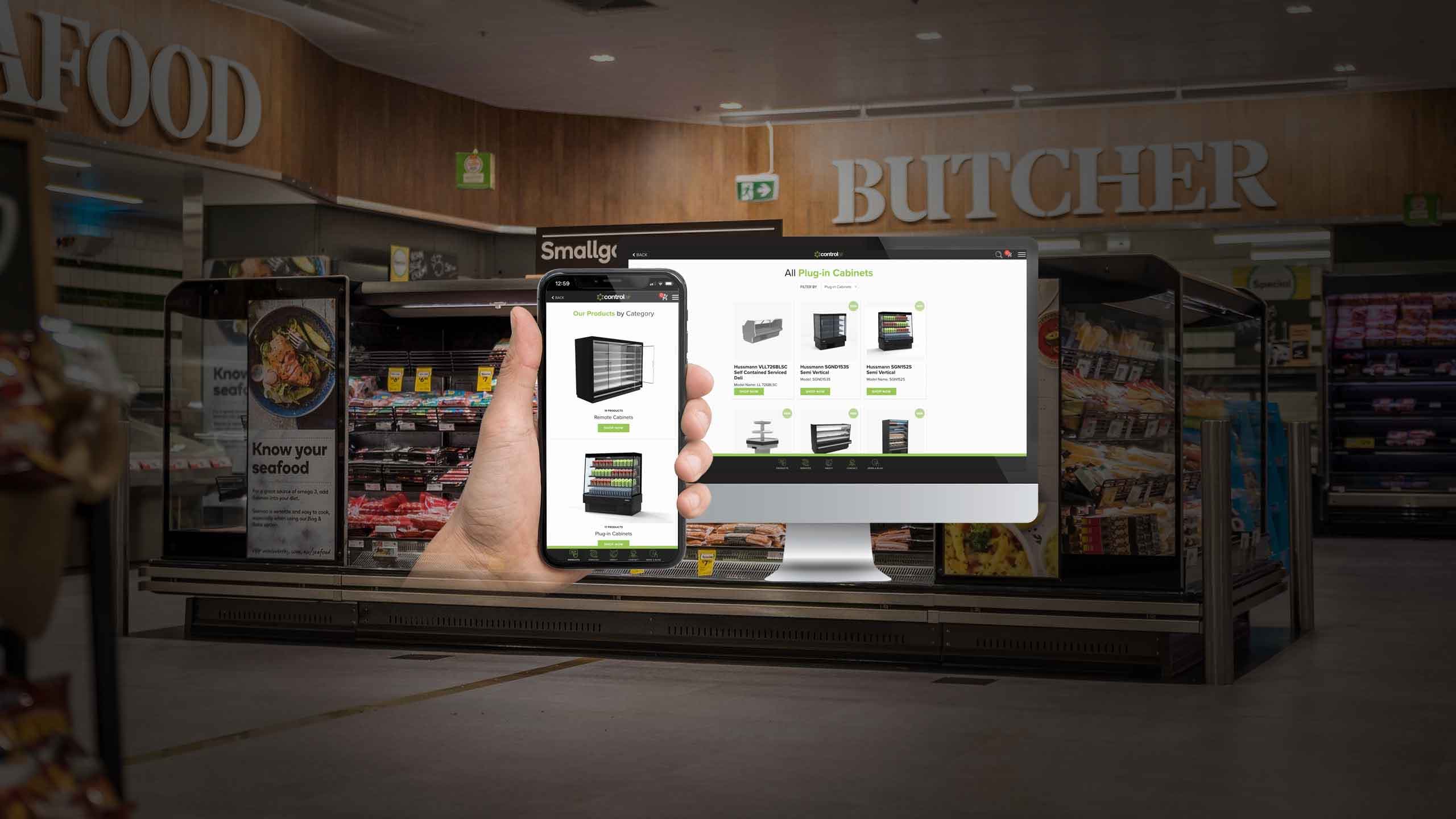 Control Air Australia plug-in cabinets page shown on a desktop monitor and smartphone in a supermarket aisle