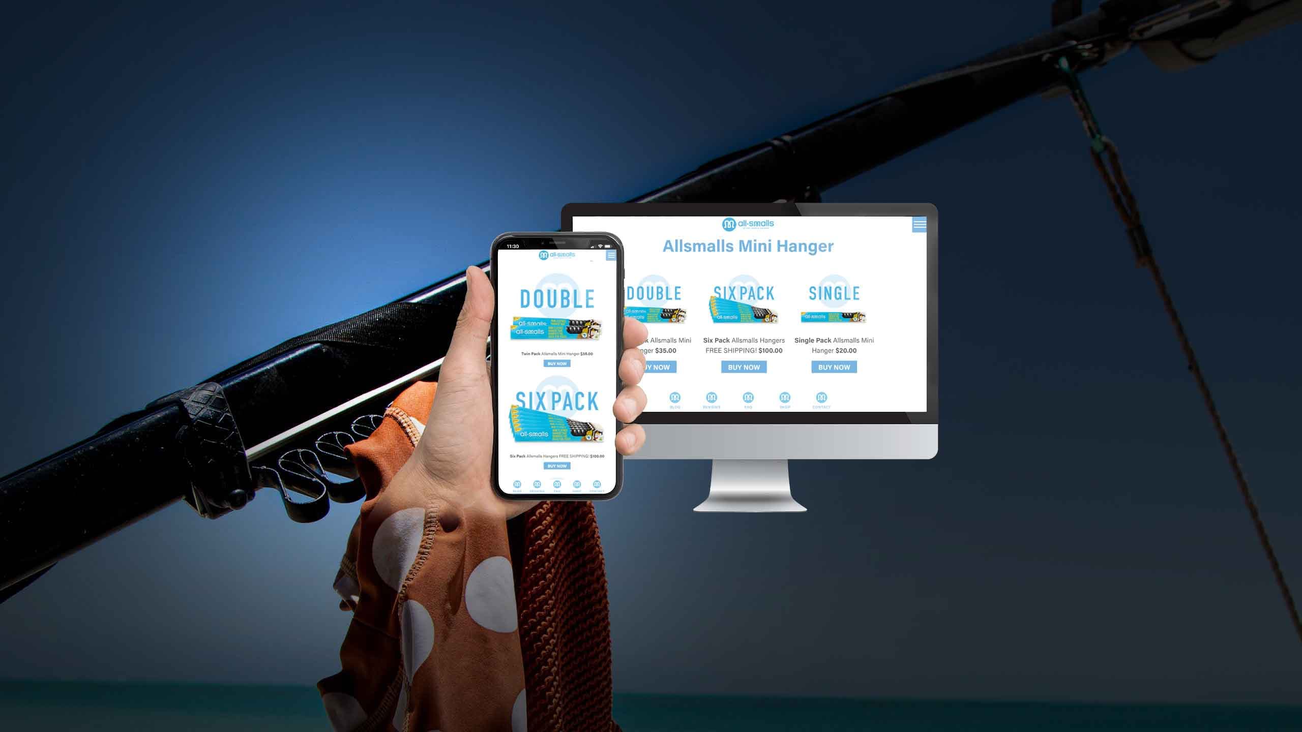 All Smalls Mini Hanger product page on a desktop monitor and smartphone over a beach backdrop