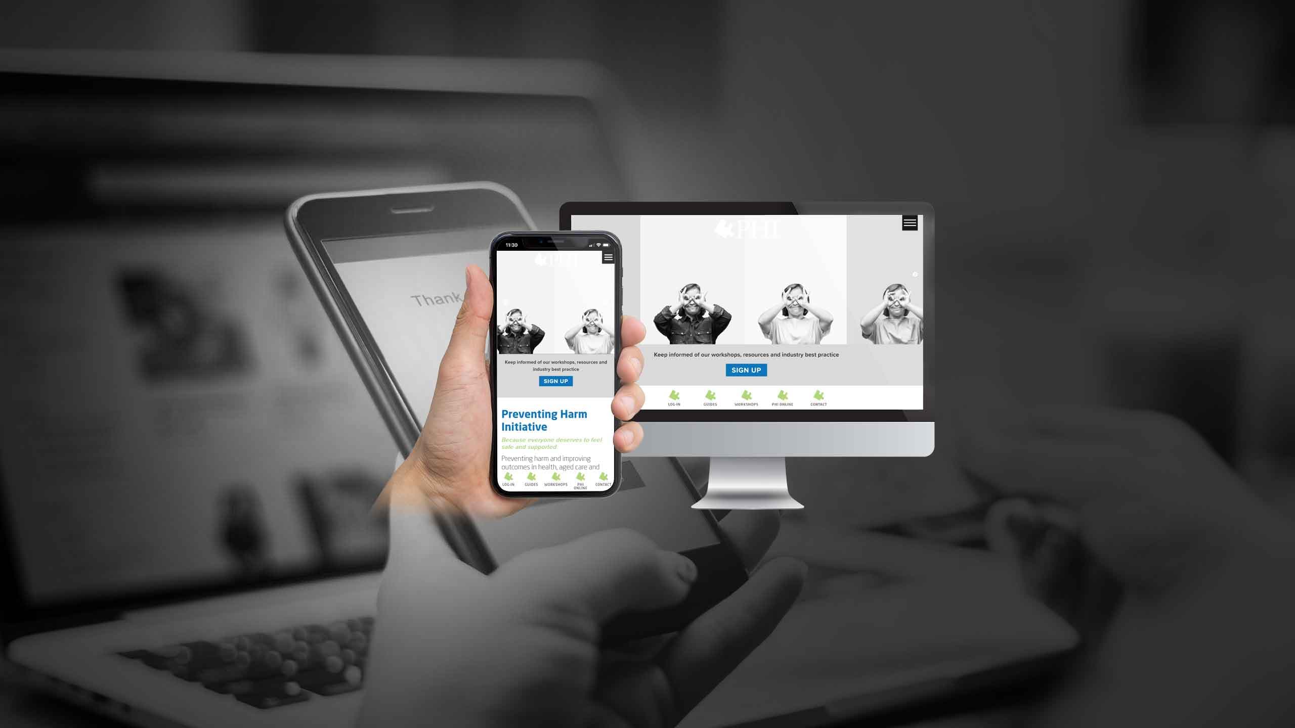 Preventing Harm Initiative website displayed on a desktop monitor and smartphone