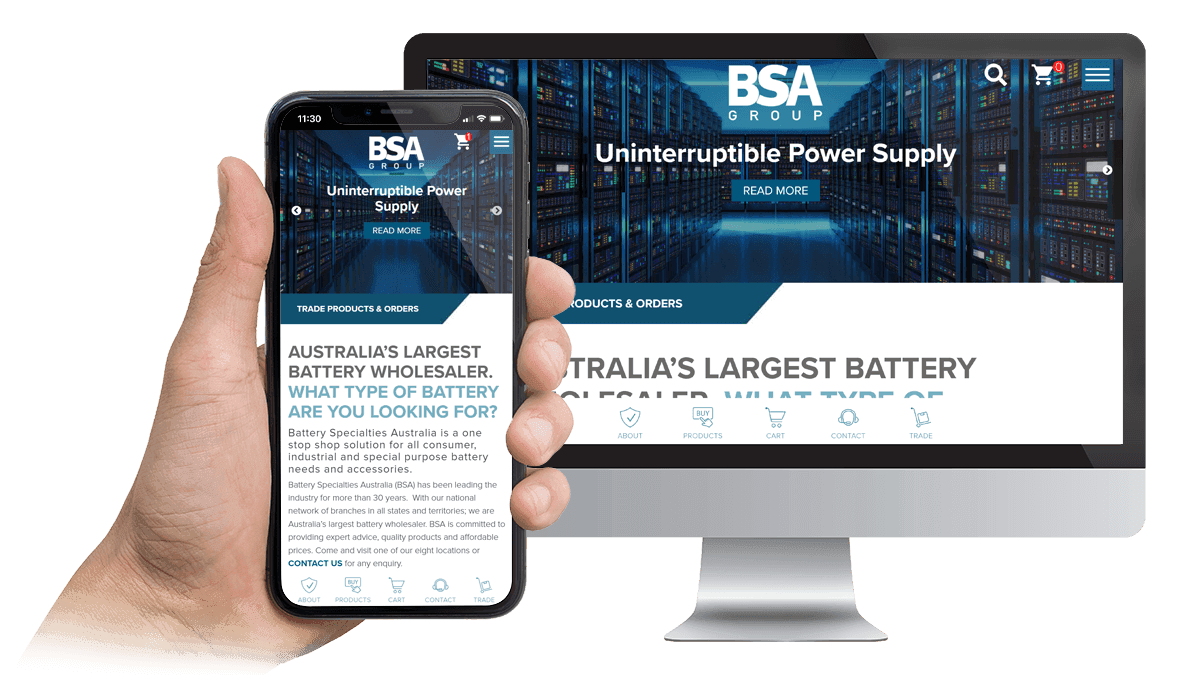 BSA Group battery wholesaler website home page shown on a desktop monitor and smartphone