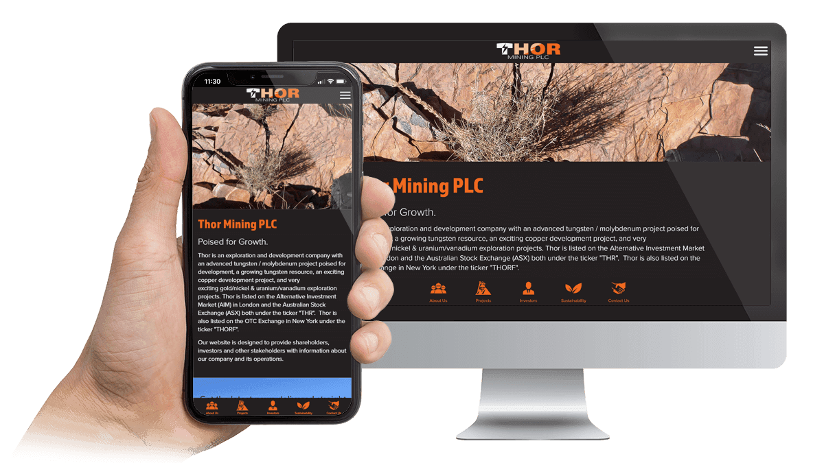 Thor Mining PLC website homepage displayed on a desktop monitor and smartphone