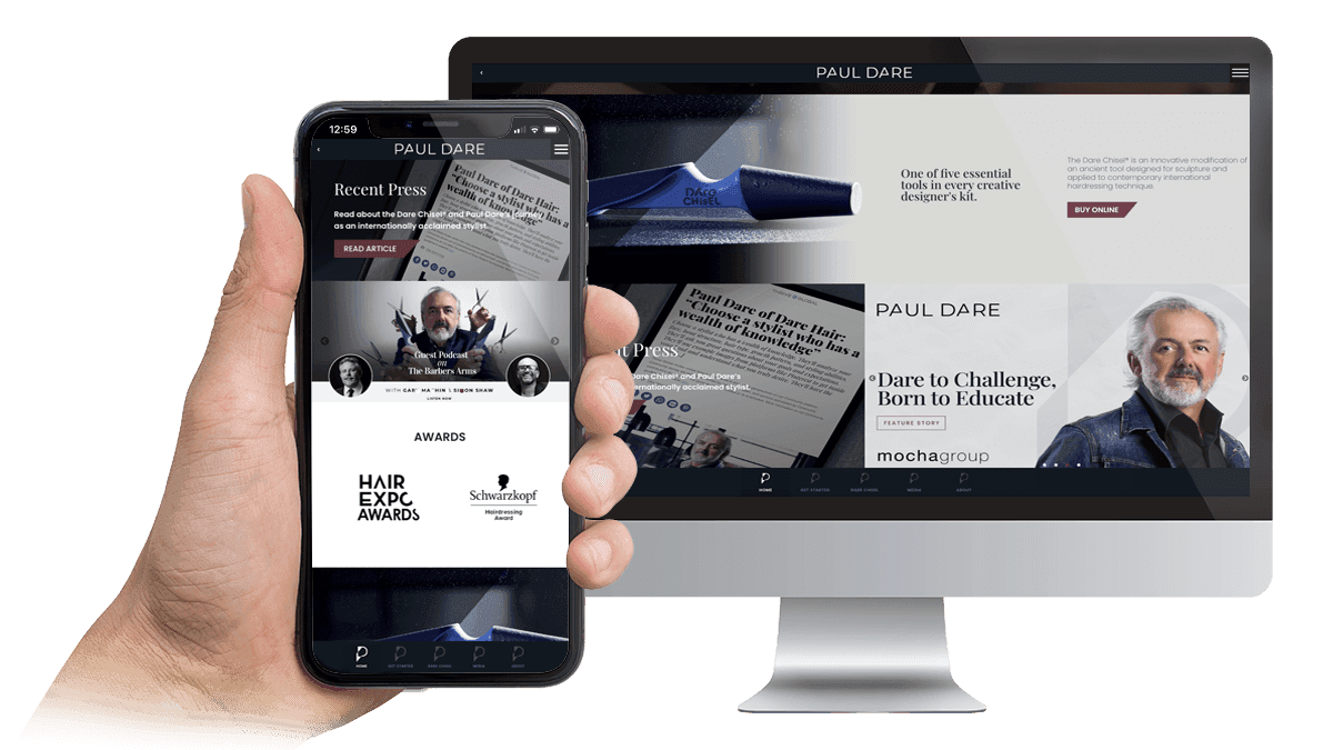 Paul Dare website homepage displayed on a desktop monitor and smartphone