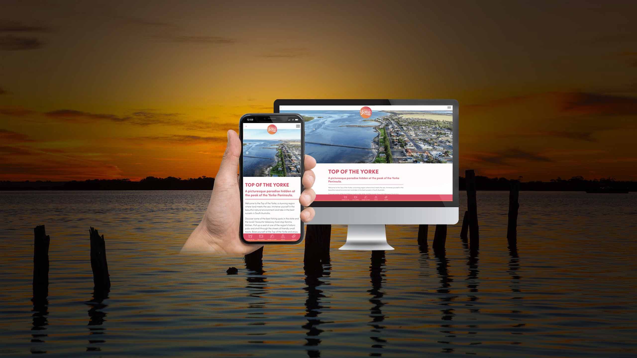 Top of the Yorke website homepage shown on desktop and smartphone over a sunset seascape
