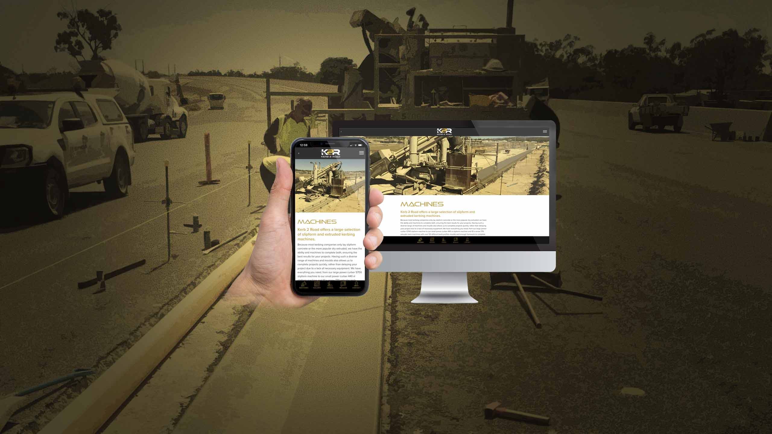 Kerb 2 Road machines page displayed over a kerb-laying construction site