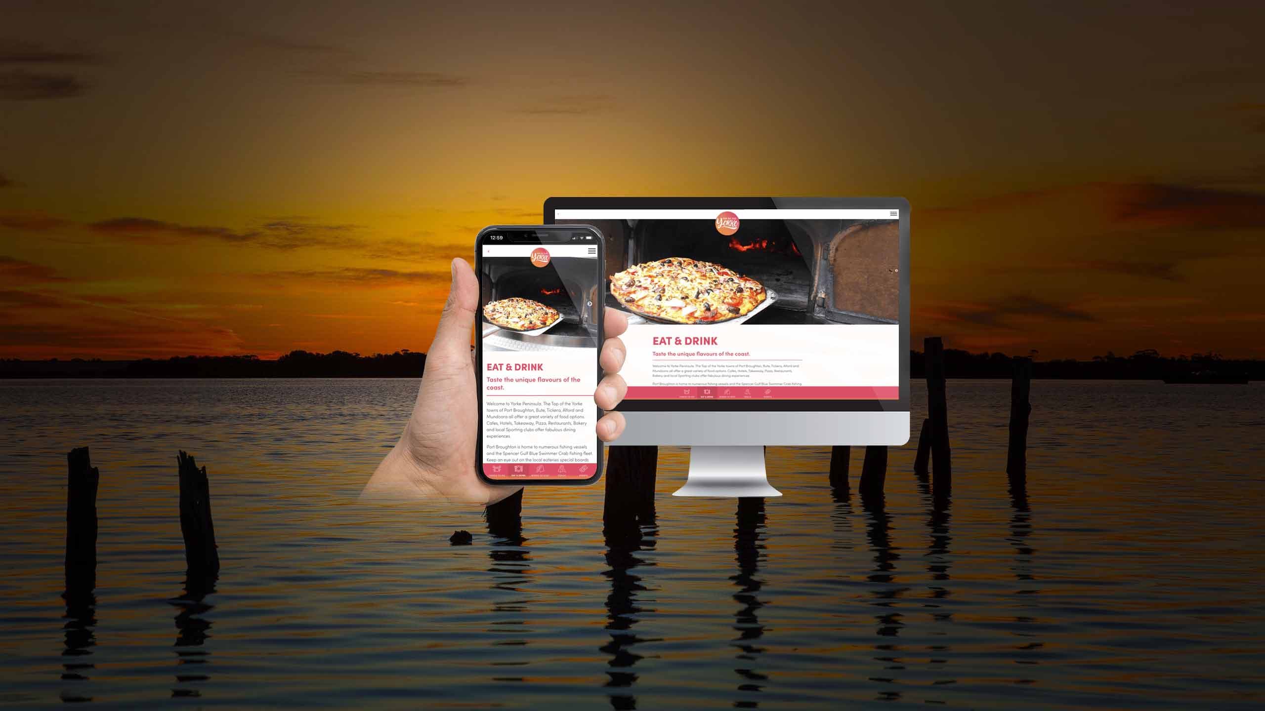 Top of the Yorke Eat & Drink page shown on desktop and smartphone over a sunset seascape