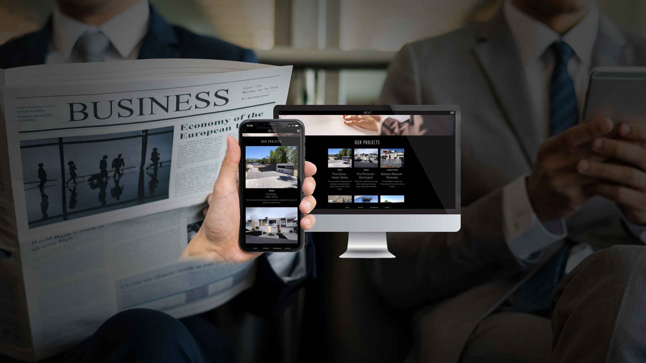 Adroit Developers projects page shown on a desktop monitor and smartphone held by a businessman reading the news