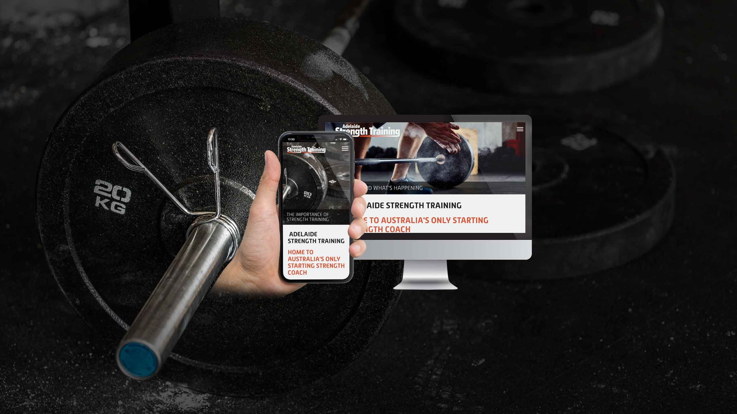 Adelaide Strength Training website homepage displayed on a desktop monitor and smartphone over a gym weight plate background