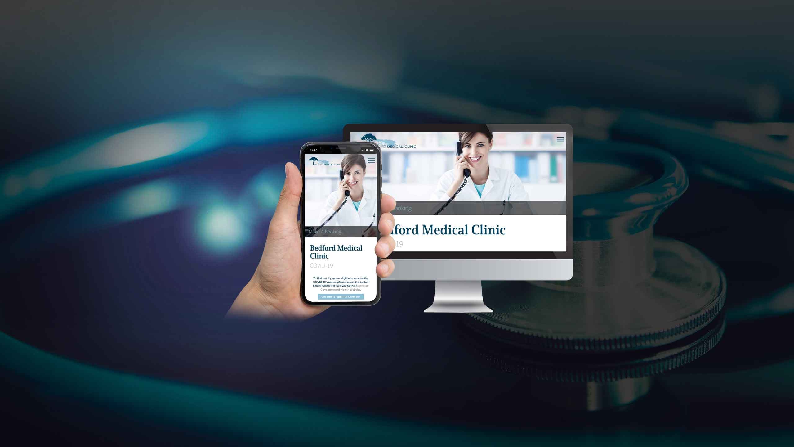 Bedford Medical Clinic website displayed on a desktop monitor and smartphone over a stethoscope backdrop