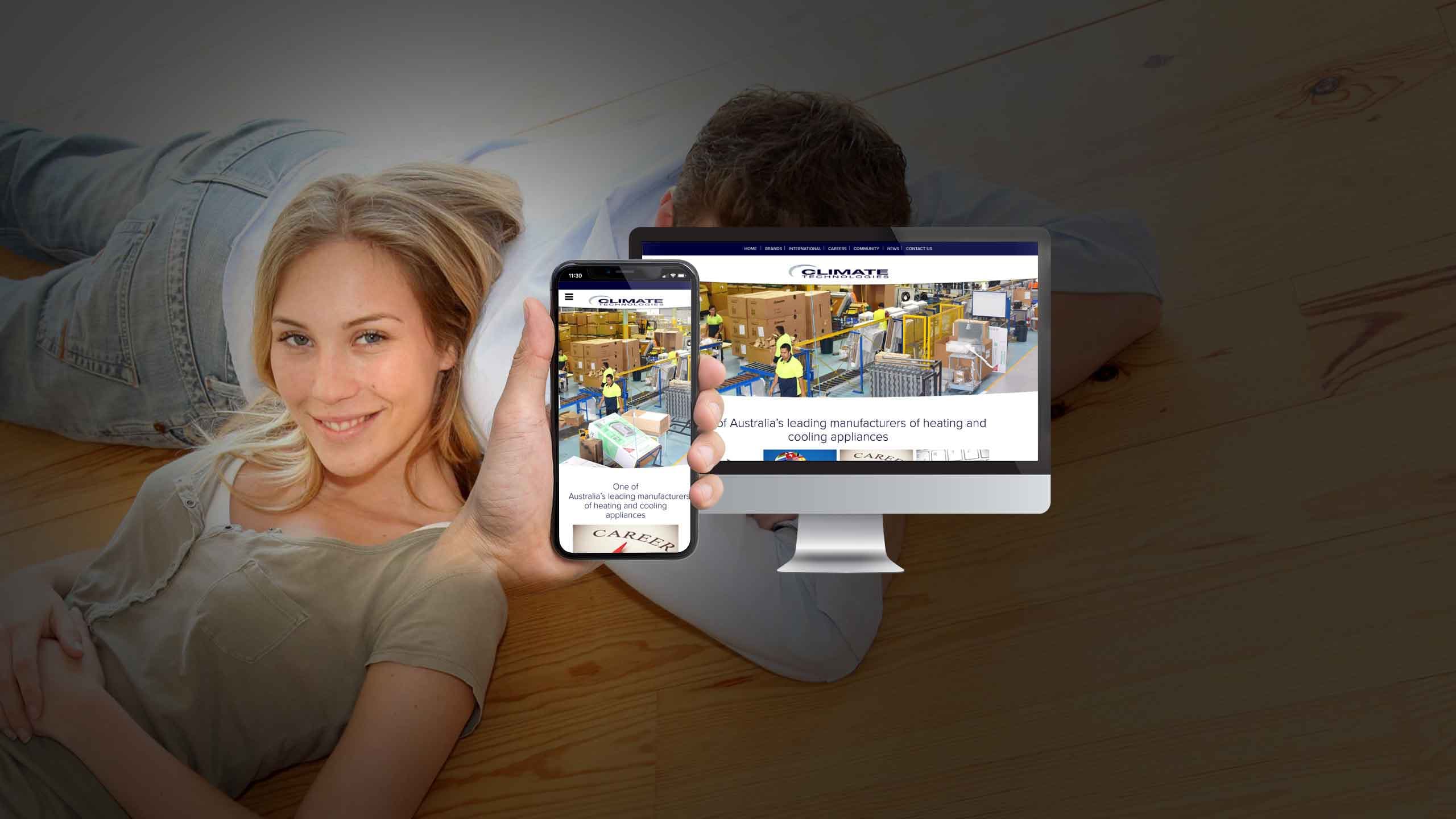 Climate Technologies website displayed on a desktop monitor and smartphone held by a woman relaxing at home