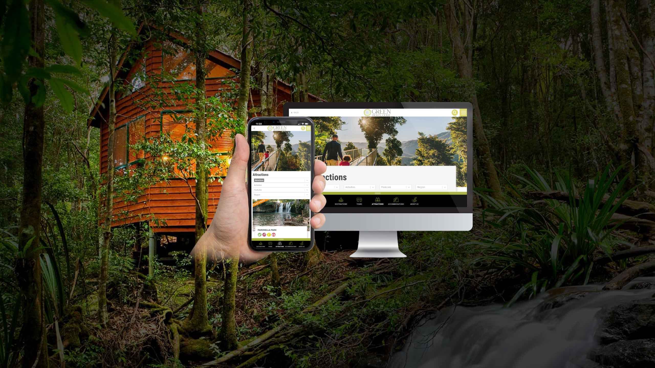 Green Travel Guide Attractions page displayed on a desktop monitor and smartphone in a forest setting