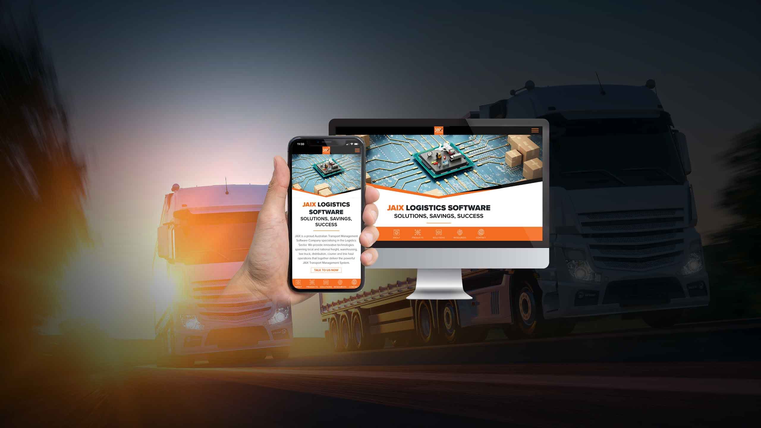 JAIX Logistics Software website homepage displayed on a desktop monitor and smartphone over a highway truck scene
