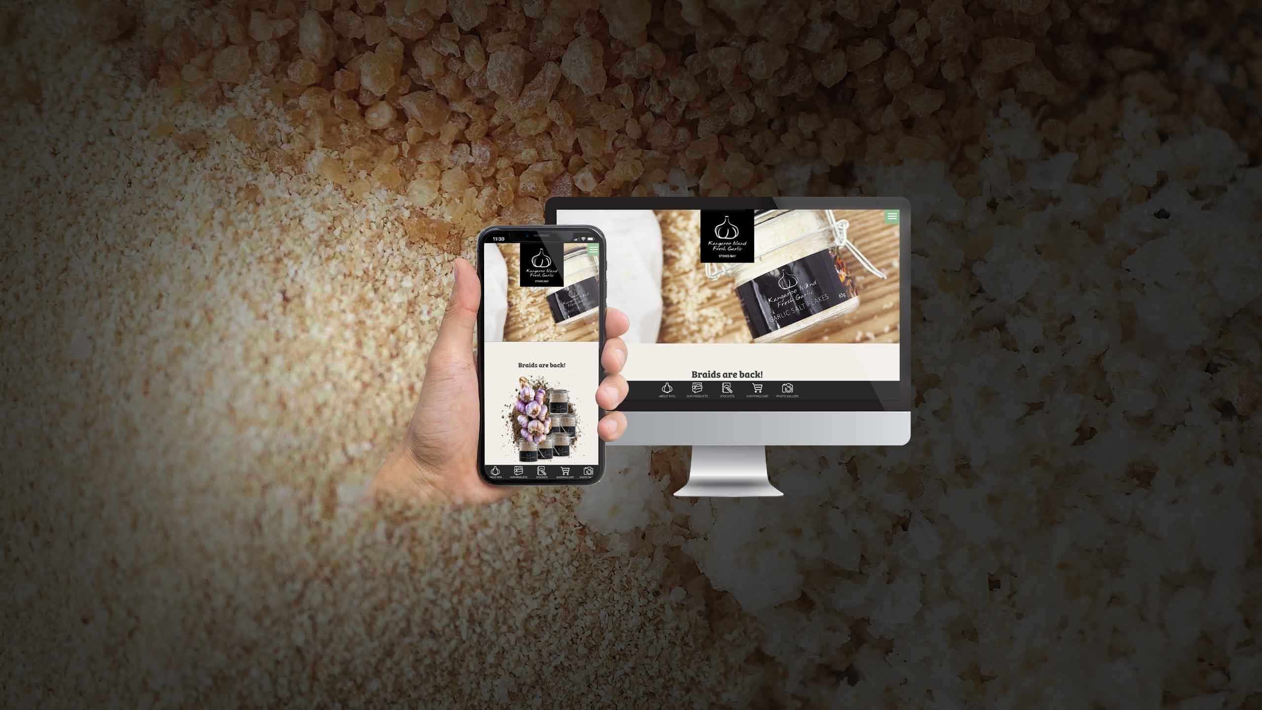 Kangaroo Island Fresh Garlic website displayed on a desktop monitor and smartphone against a garlic bulb backdrop