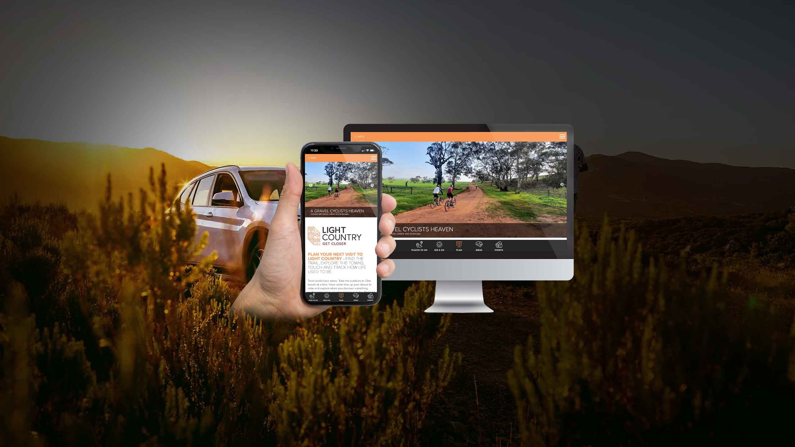 Light Country Gravel Cyclists Heaven page displayed on a desktop monitor and smartphone, sunset field backdrop