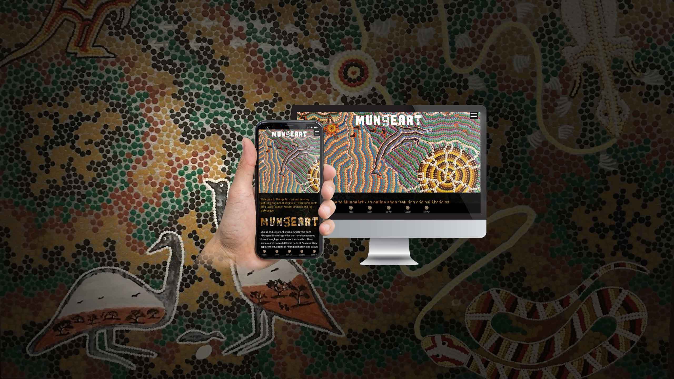 MungeArt website homepage displayed on a desktop monitor and smartphone over an Aboriginal dot-art background