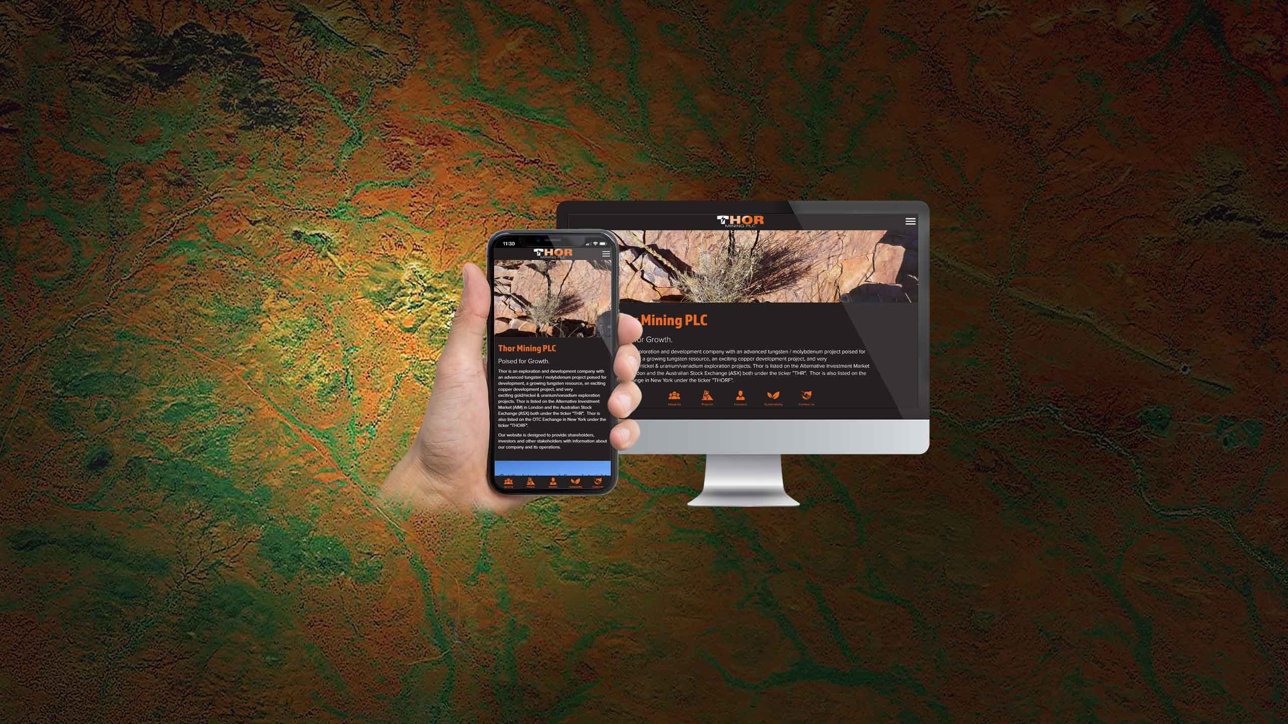 Thor Mining PLC website homepage displayed on a desktop monitor and smartphone over an outback mineral texture