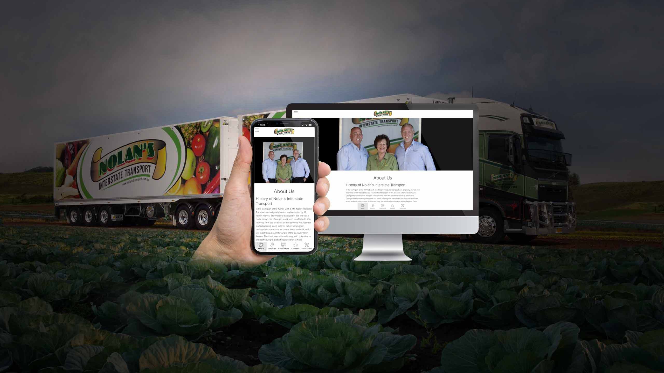 Nolan's Transport website About Us page on a desktop monitor and smartphone beside a branded produce truck