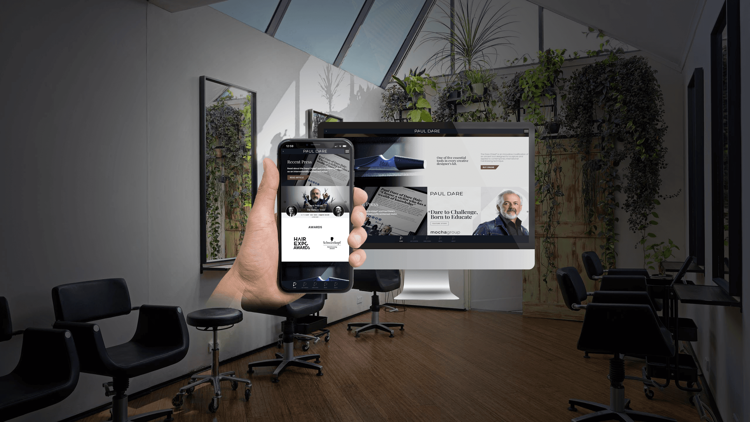Paul Dare website homepage on a desktop monitor and smartphone in a hair salon