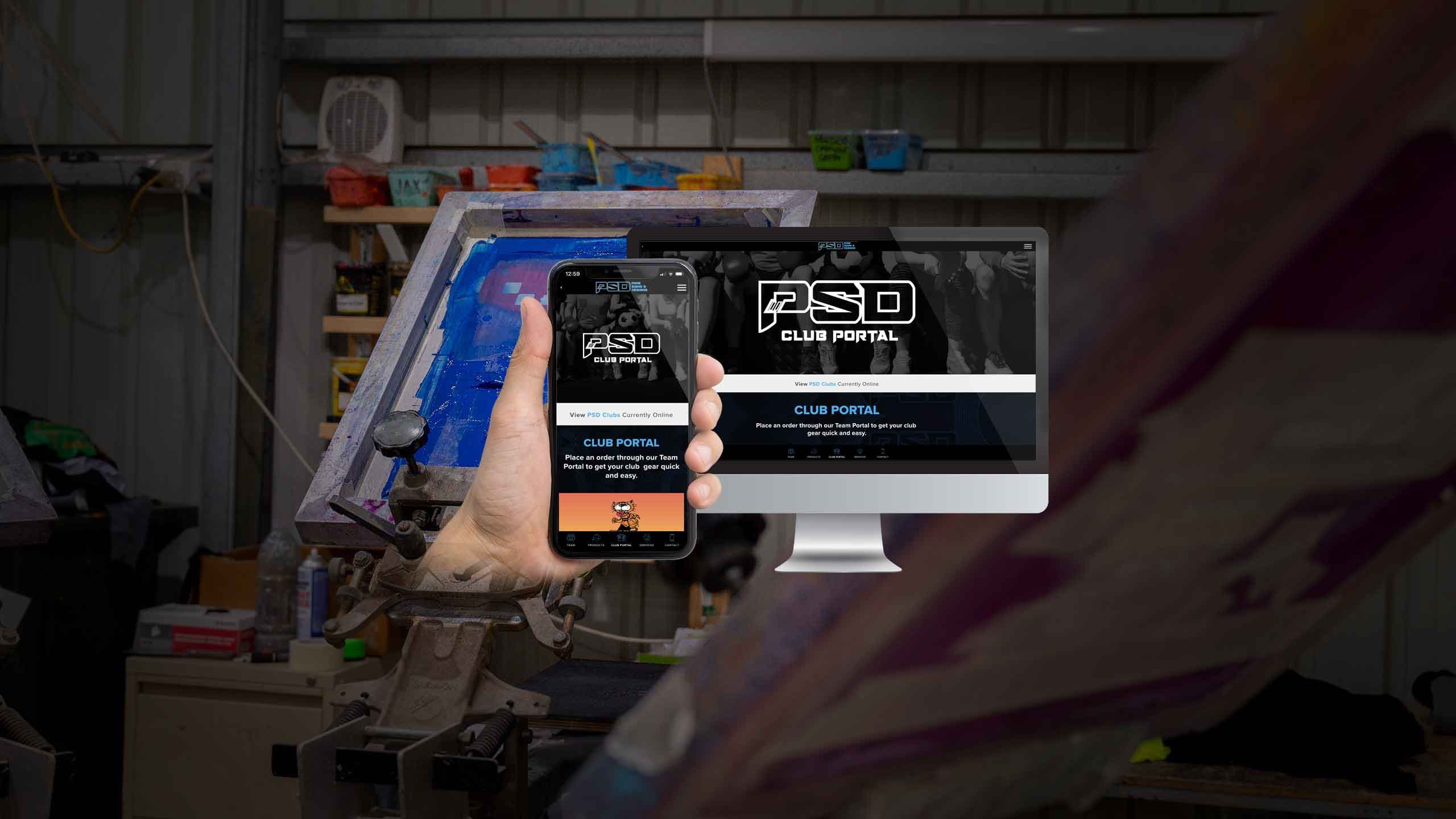 Pirie Signs & Designs Club Portal page displayed on a desktop monitor and smartphone in a screen-printing workshop