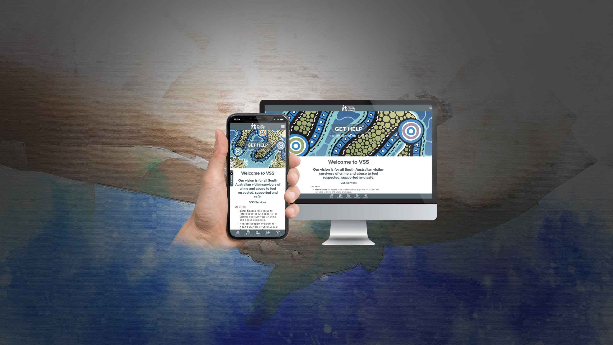 Victim Support Service website homepage displayed on a desktop monitor and smartphone